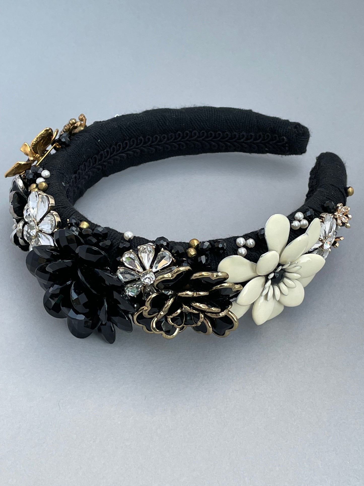 Elaborate brooch encrusted black and white large padded headband