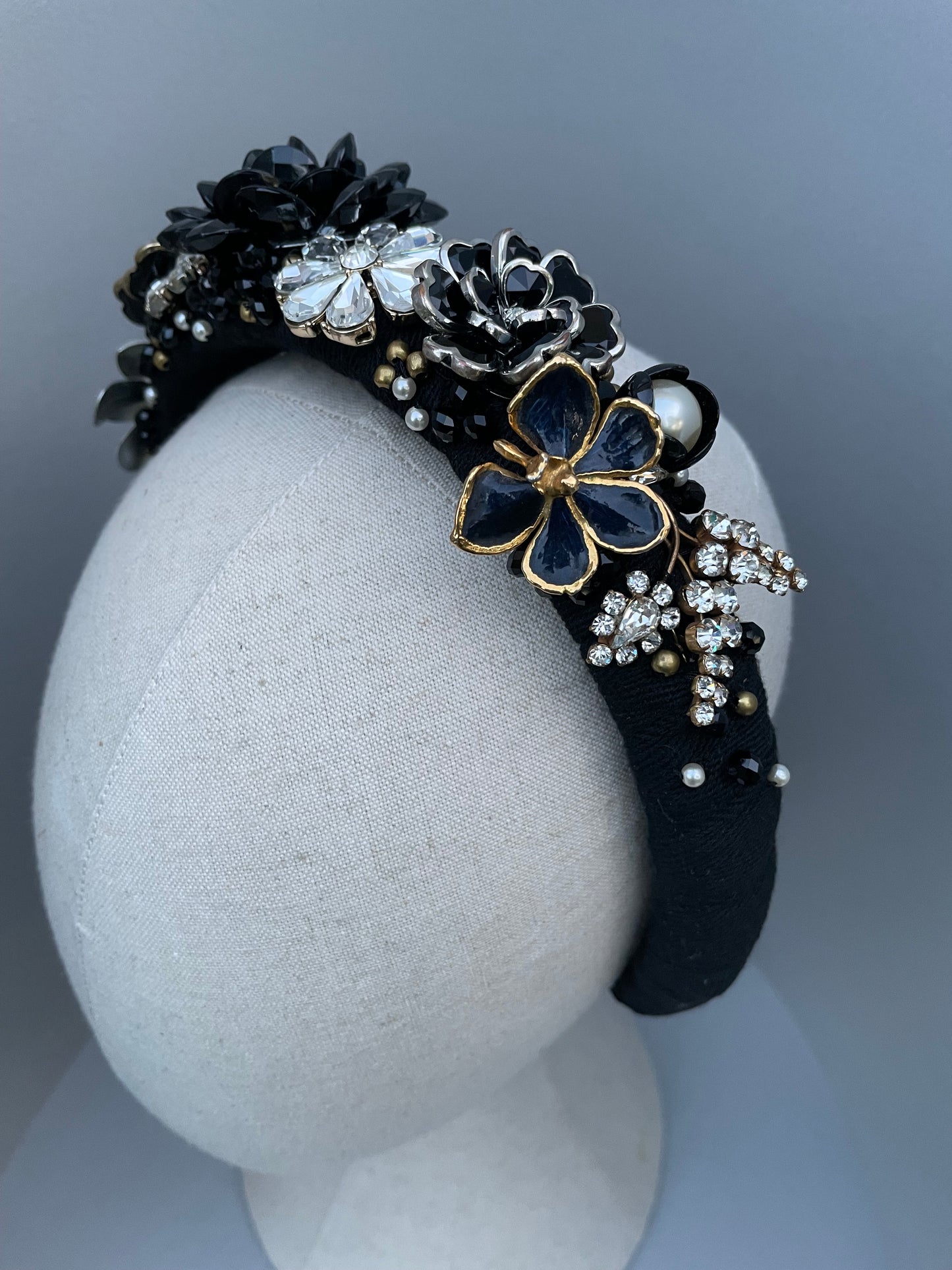 Elaborate brooch encrusted black and white large padded headband