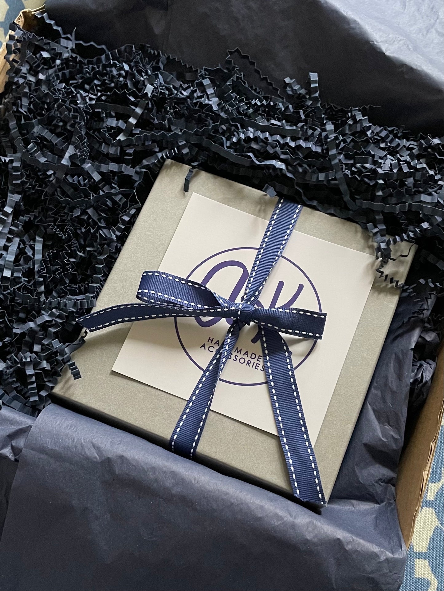 Cobalt blue herringbone padded headband with black velvet and silk flowers