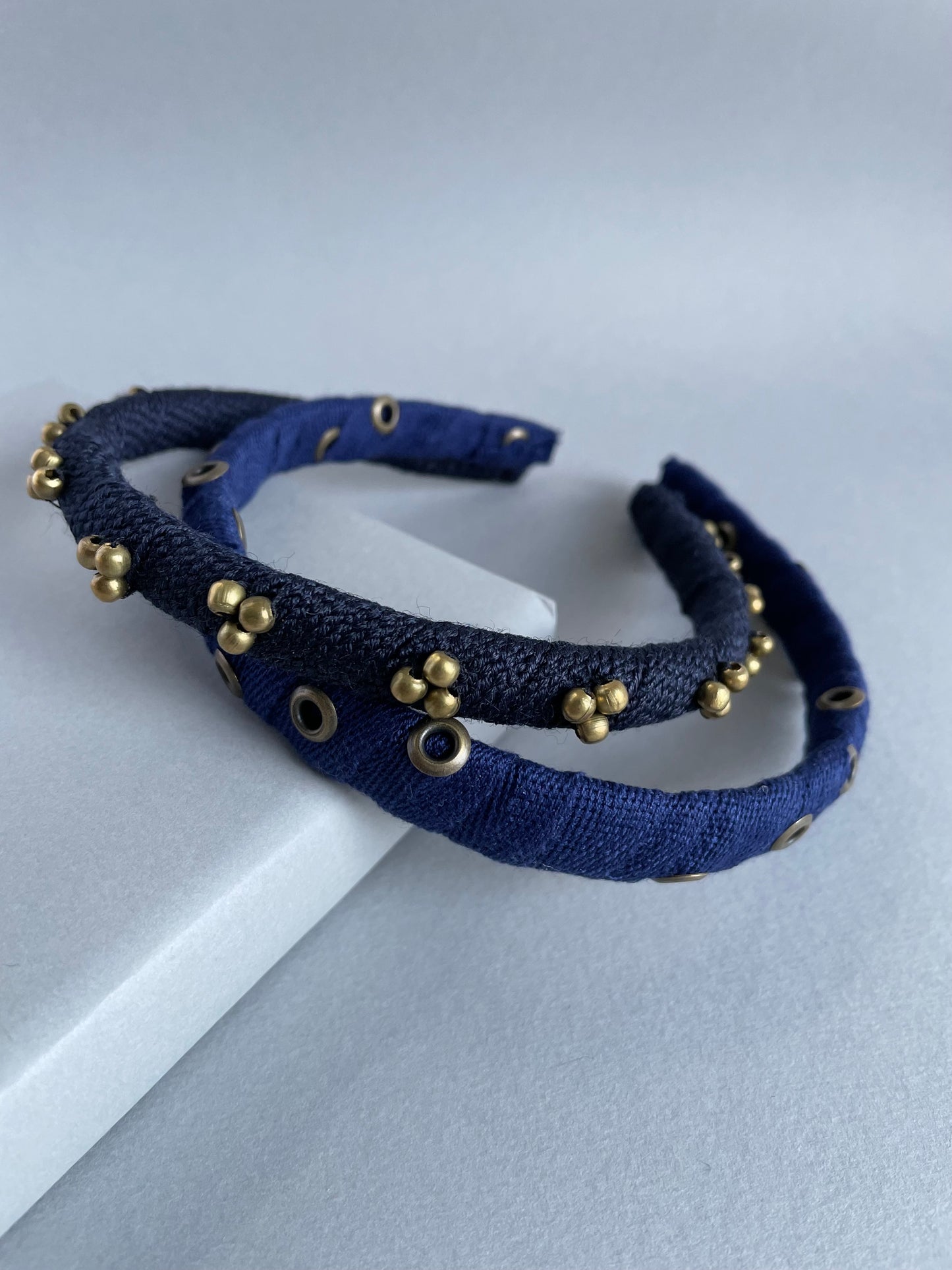 Navy and antique gold metal slim headband duo