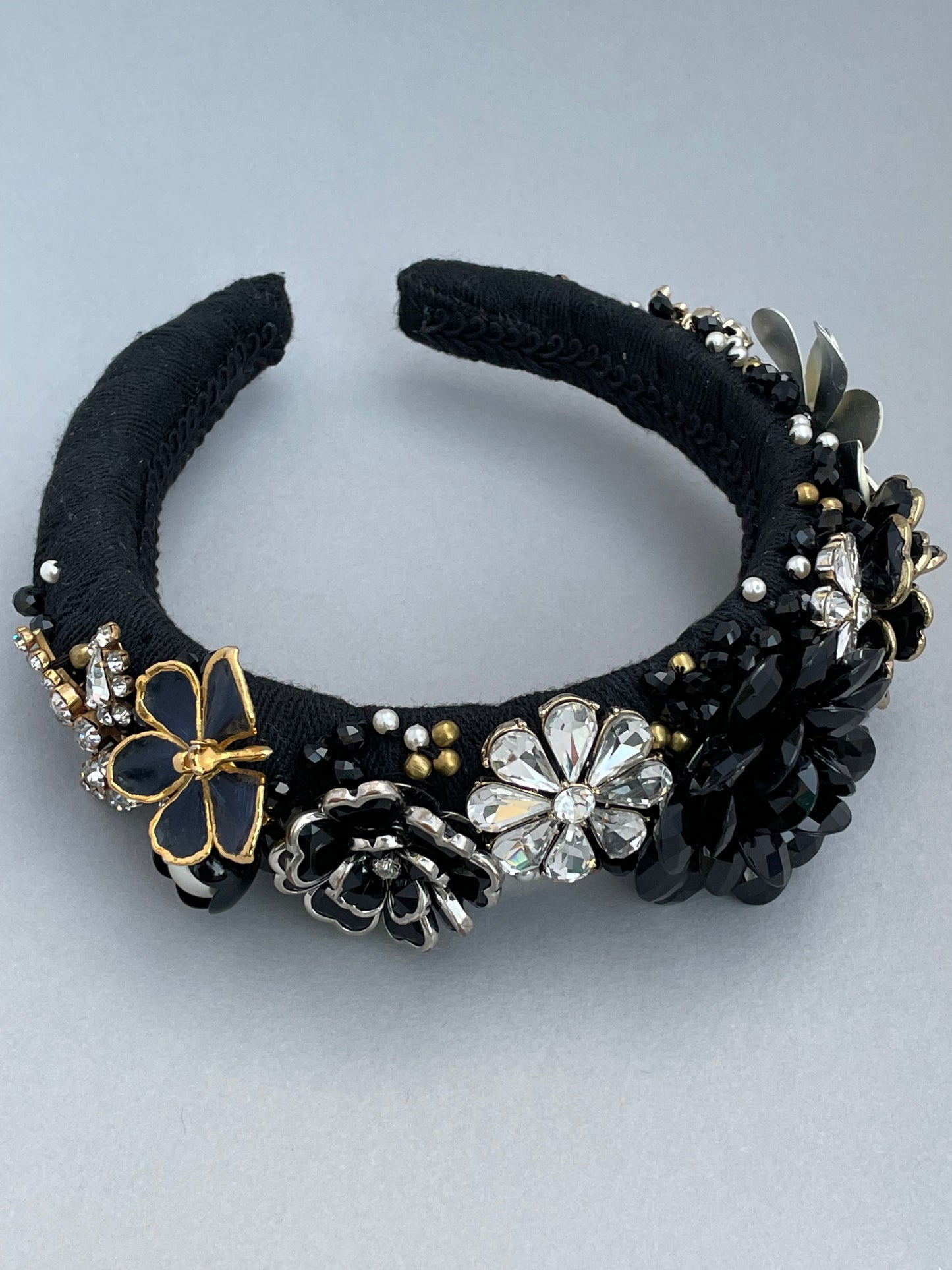 Elaborate brooch encrusted black and white large padded headband