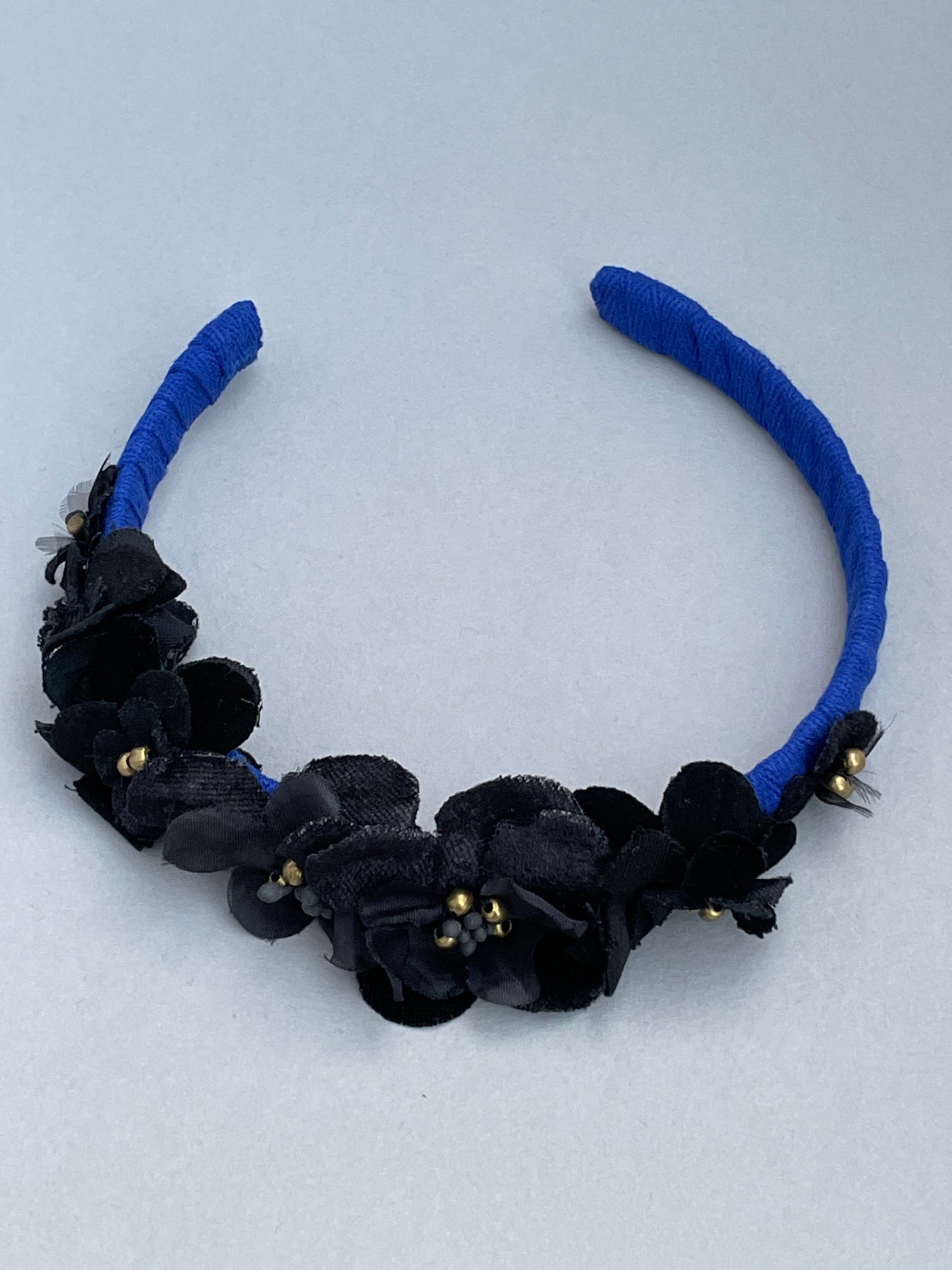 Cobalt blue slim headband with black velvet and silk flowers