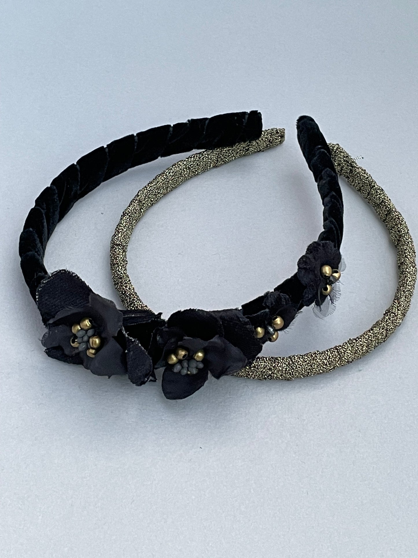 Black velvet floral detail and antique gold headband duo