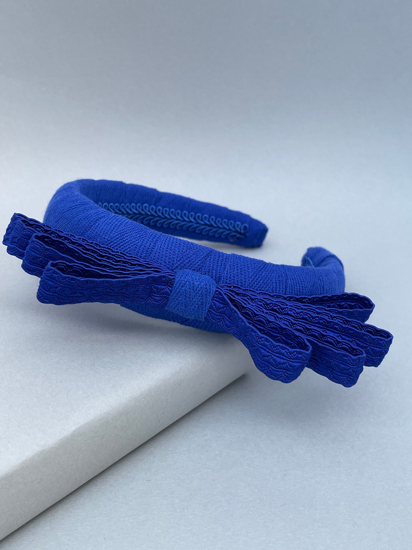 Cobalt blue herringbone padded headband with cobalt braid bow