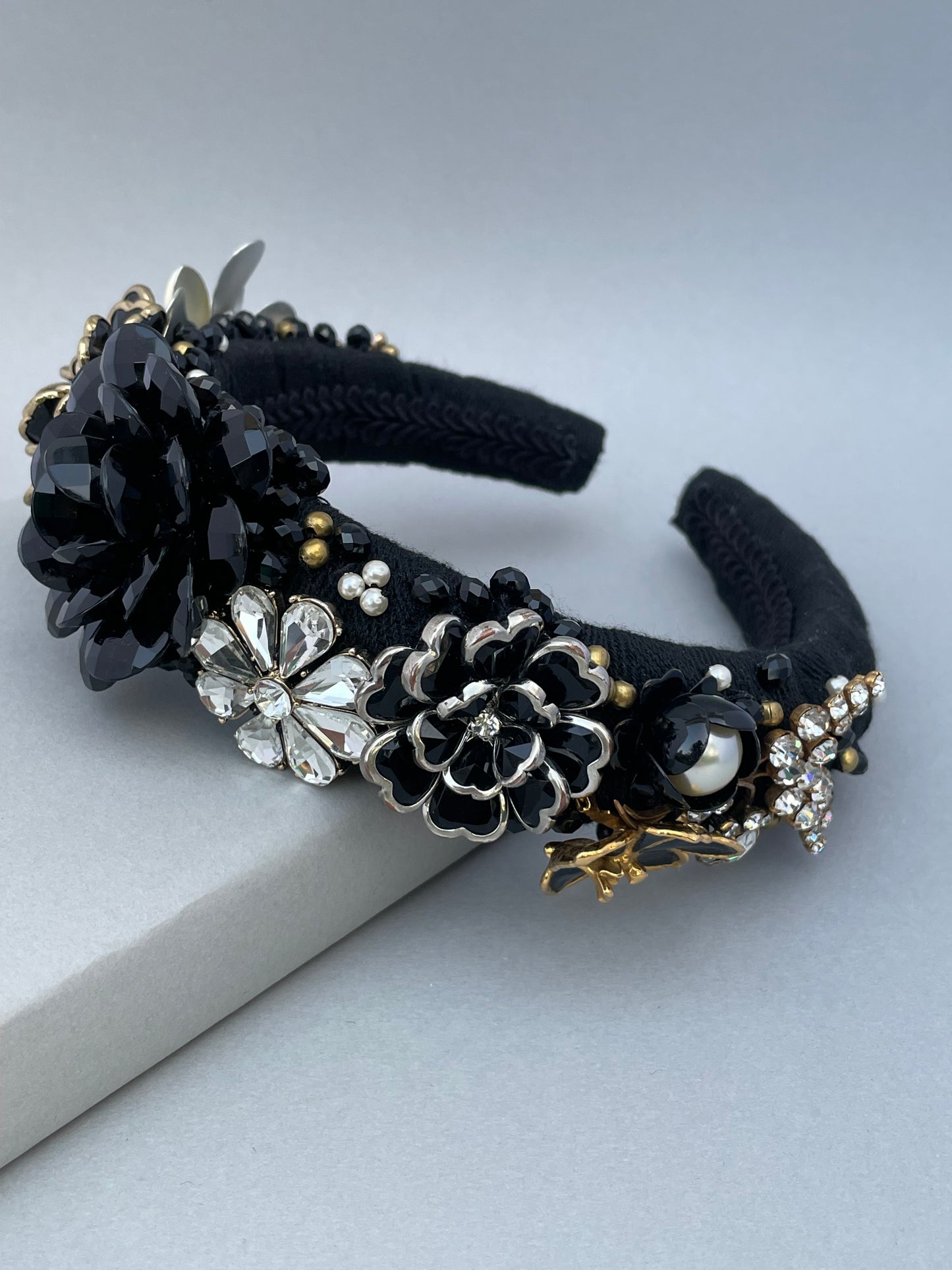 Elaborate brooch encrusted black and white large padded headband