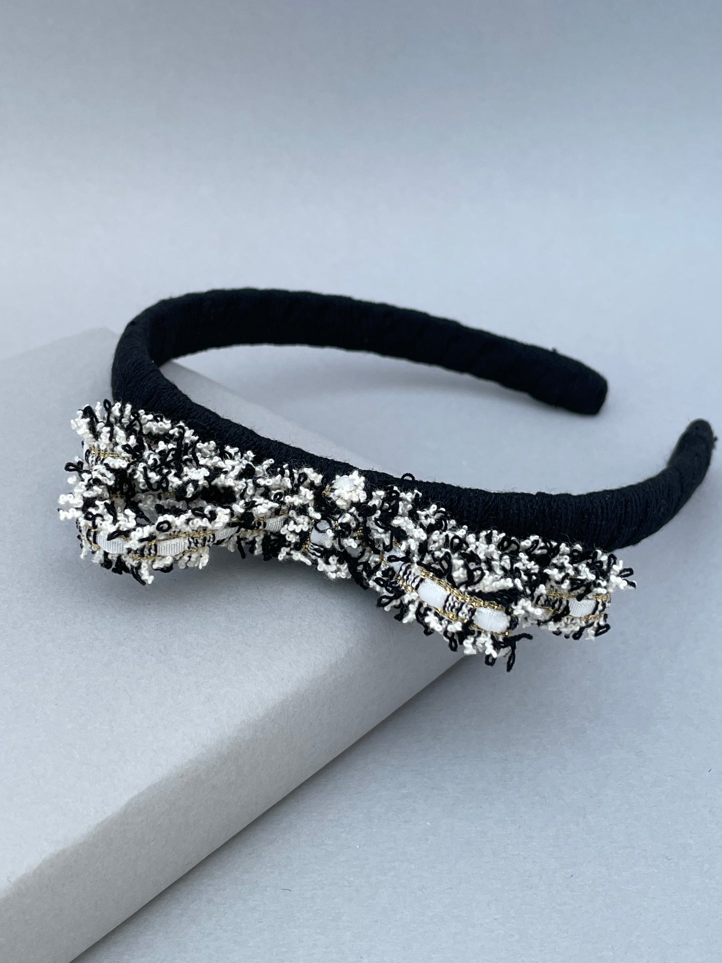 Black slim headband with black and white frayed edge bow