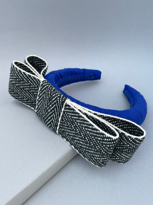 Cobalt blue large padded headband with black and white herringbone braid bow