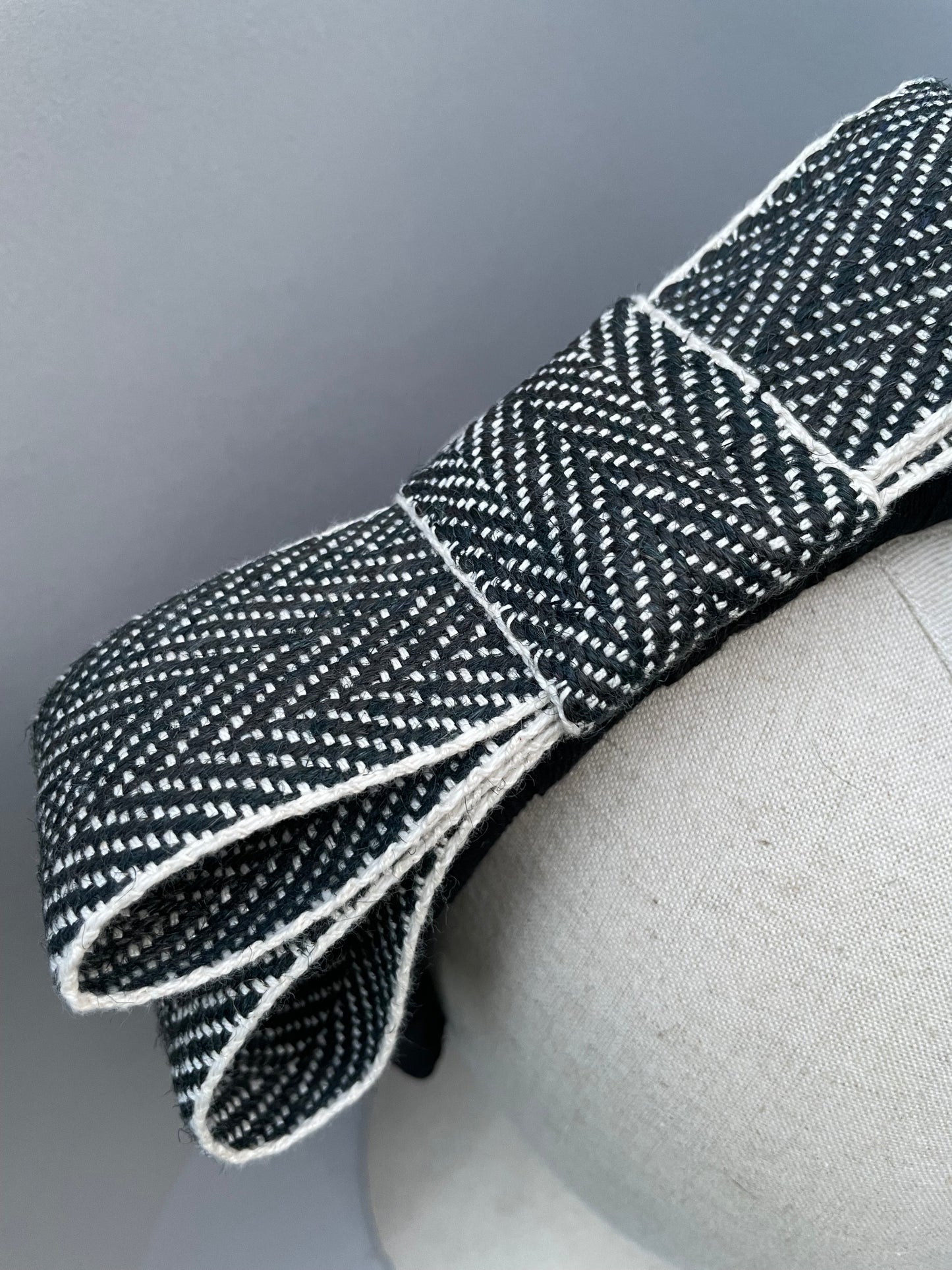 Black large padded headband with black and white herringbone braid bow