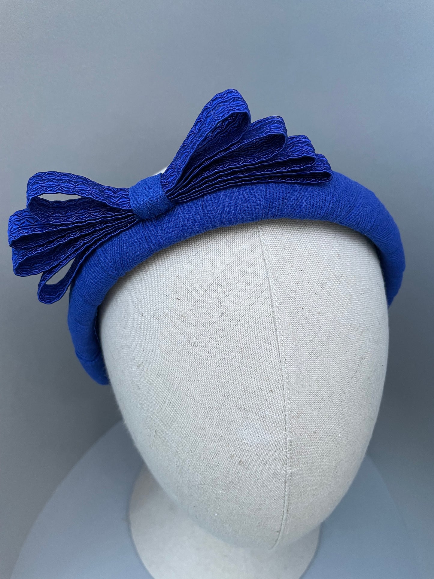 Cobalt blue herringbone padded headband with cobalt braid bow