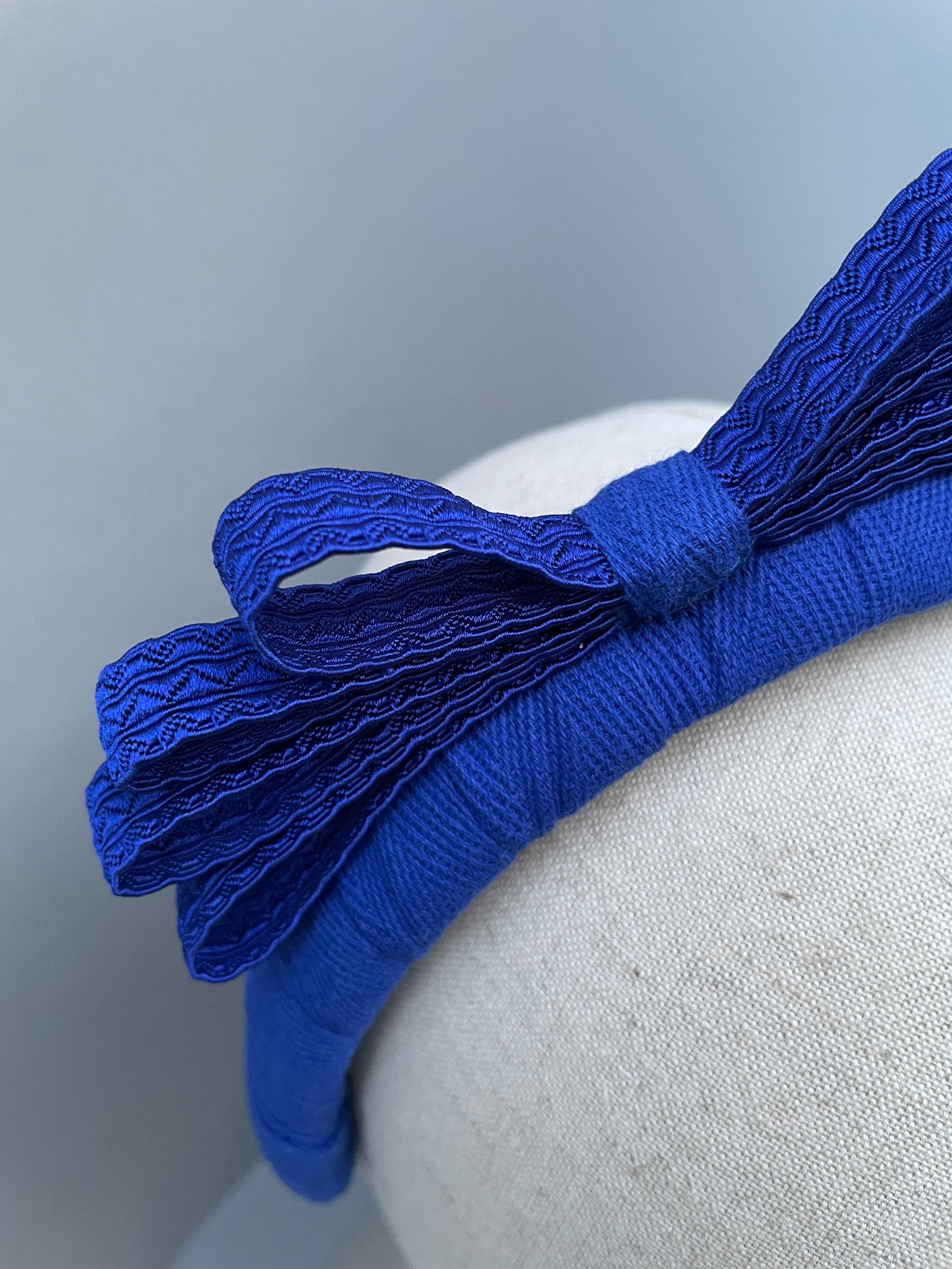 Cobalt blue herringbone padded headband with cobalt braid bow