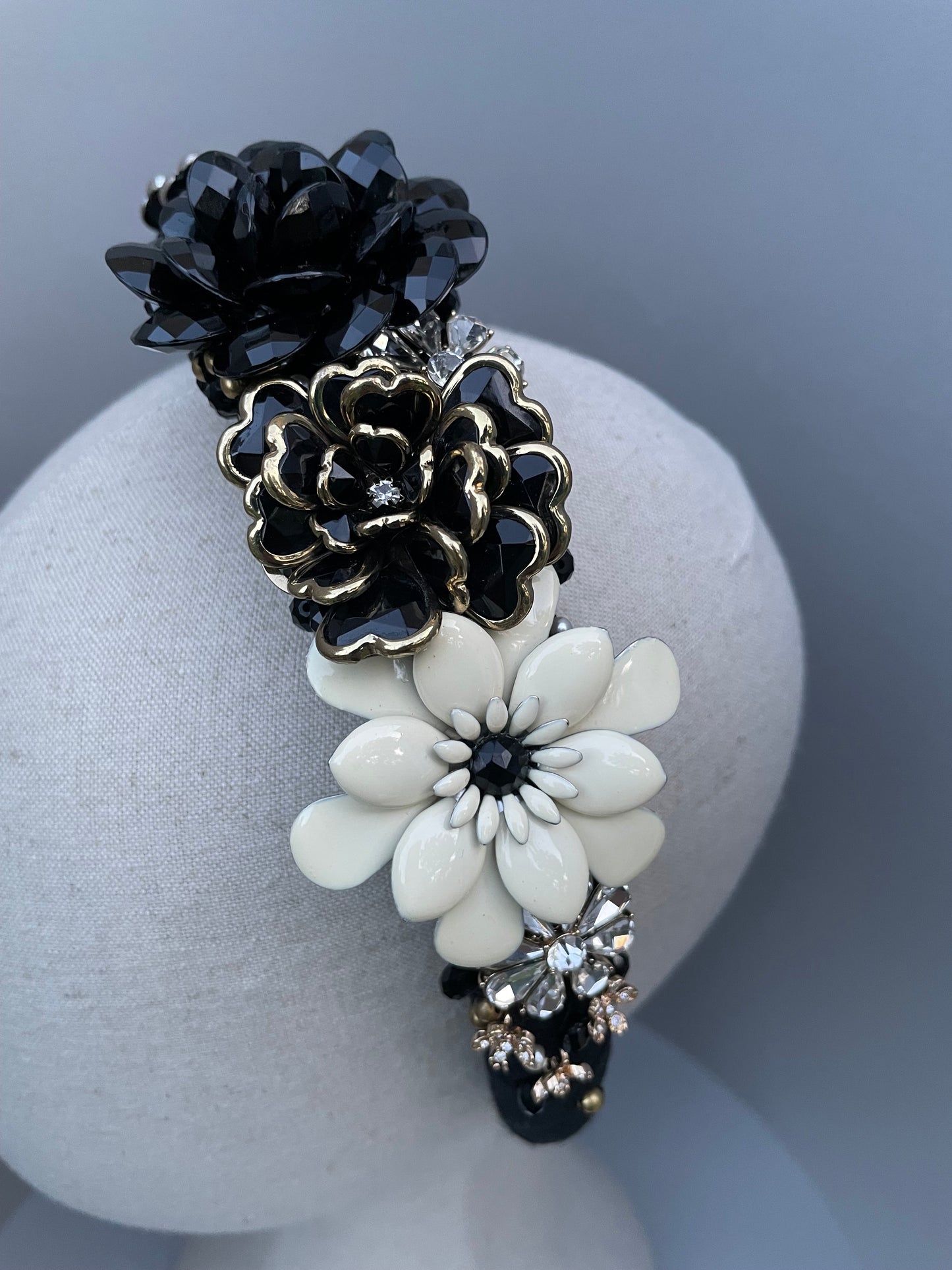 Elaborate brooch encrusted black and white large padded headband