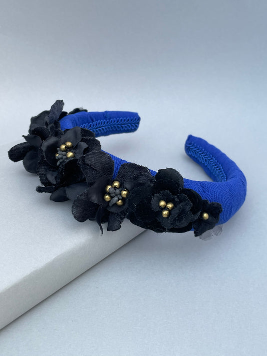 Cobalt blue herringbone padded headband with black velvet and silk flowers